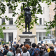 Illustration for article titled Monument of British Slave Trader Replaced With Statue of Black Lives Matter Protester